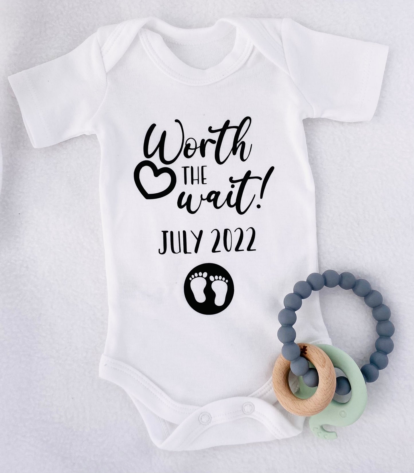 Pregnancy announcement onesie